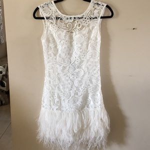 Beautiful Lipsy White feathers mini dress